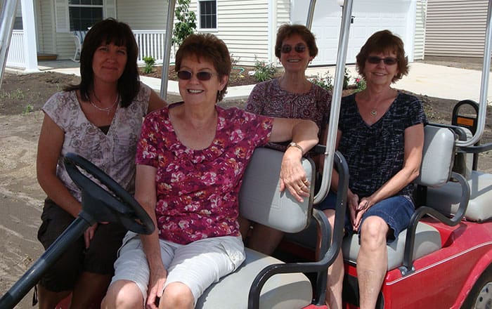 senior living residents in a golf cart springfield illinois