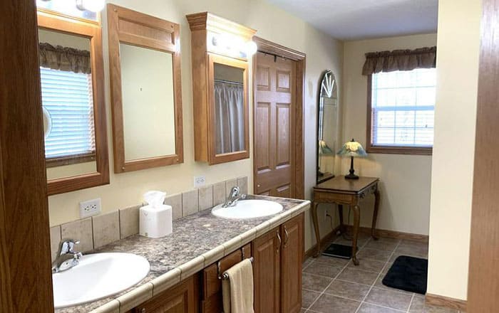 his and her sinks in Timber Creek Living home in springfield illinois